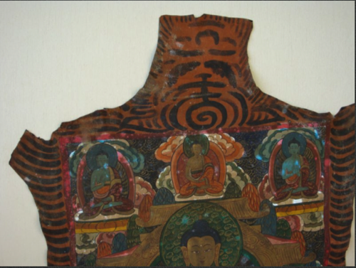 Tibetan Thanka ( close up ) before conservation. Artwork damaged with fungus Tibetan Thanka ( close up ) before conservation. Artwork damaged with fungus